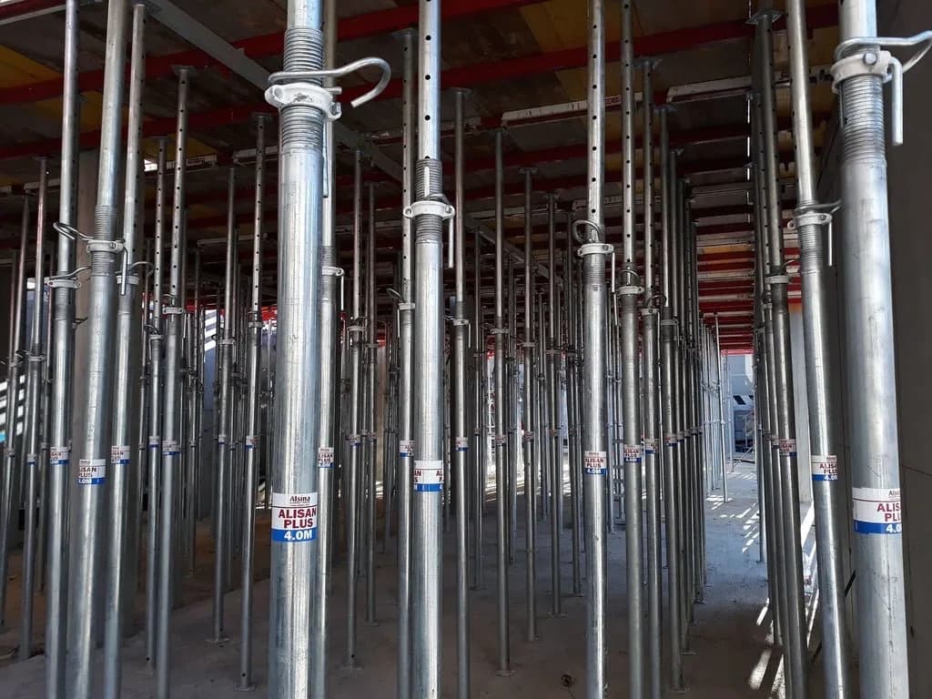 Shoring props supporting a concrete slab on a construction site